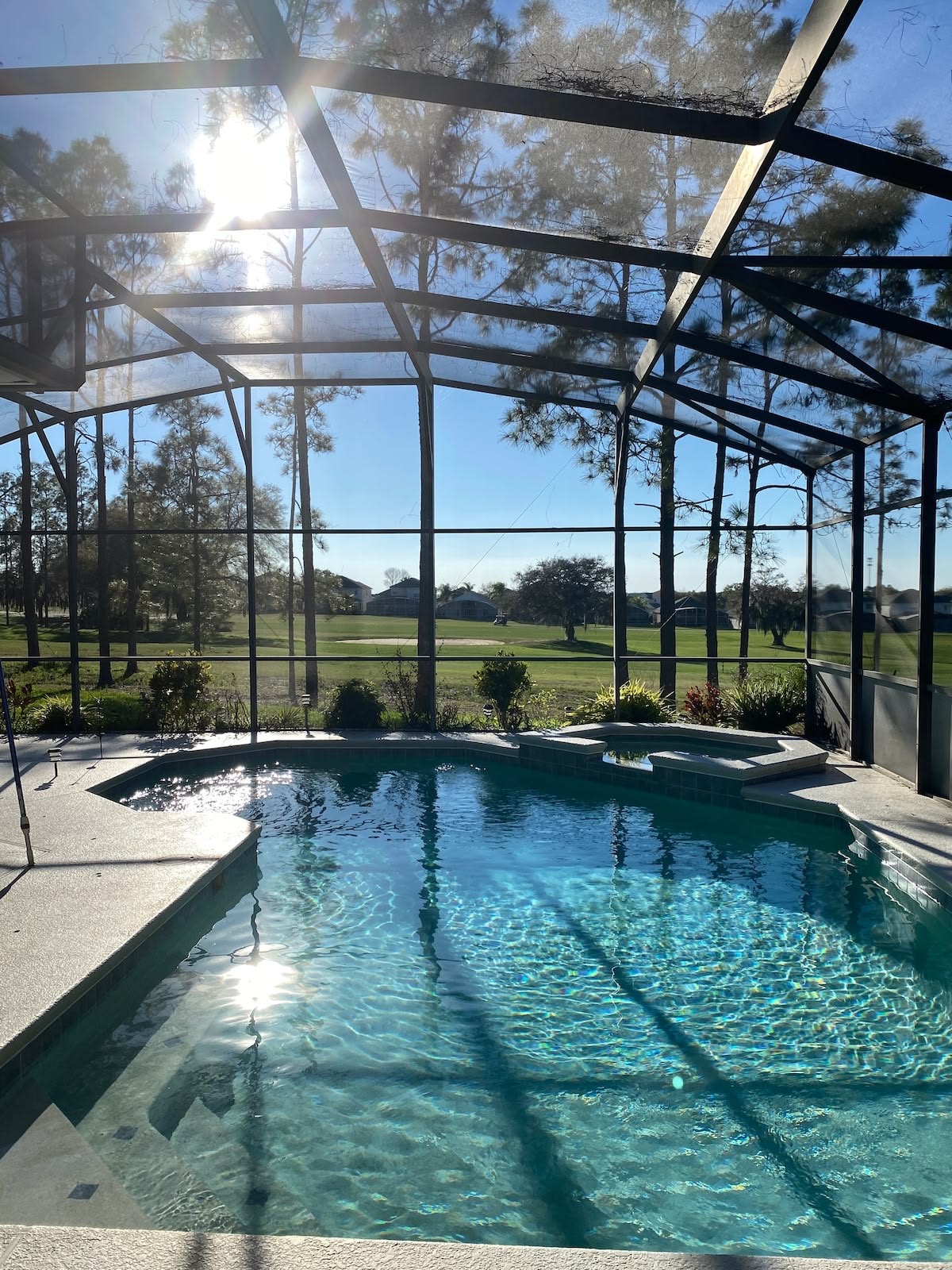 Lanai screen enclosure rescreened with clear golf course view